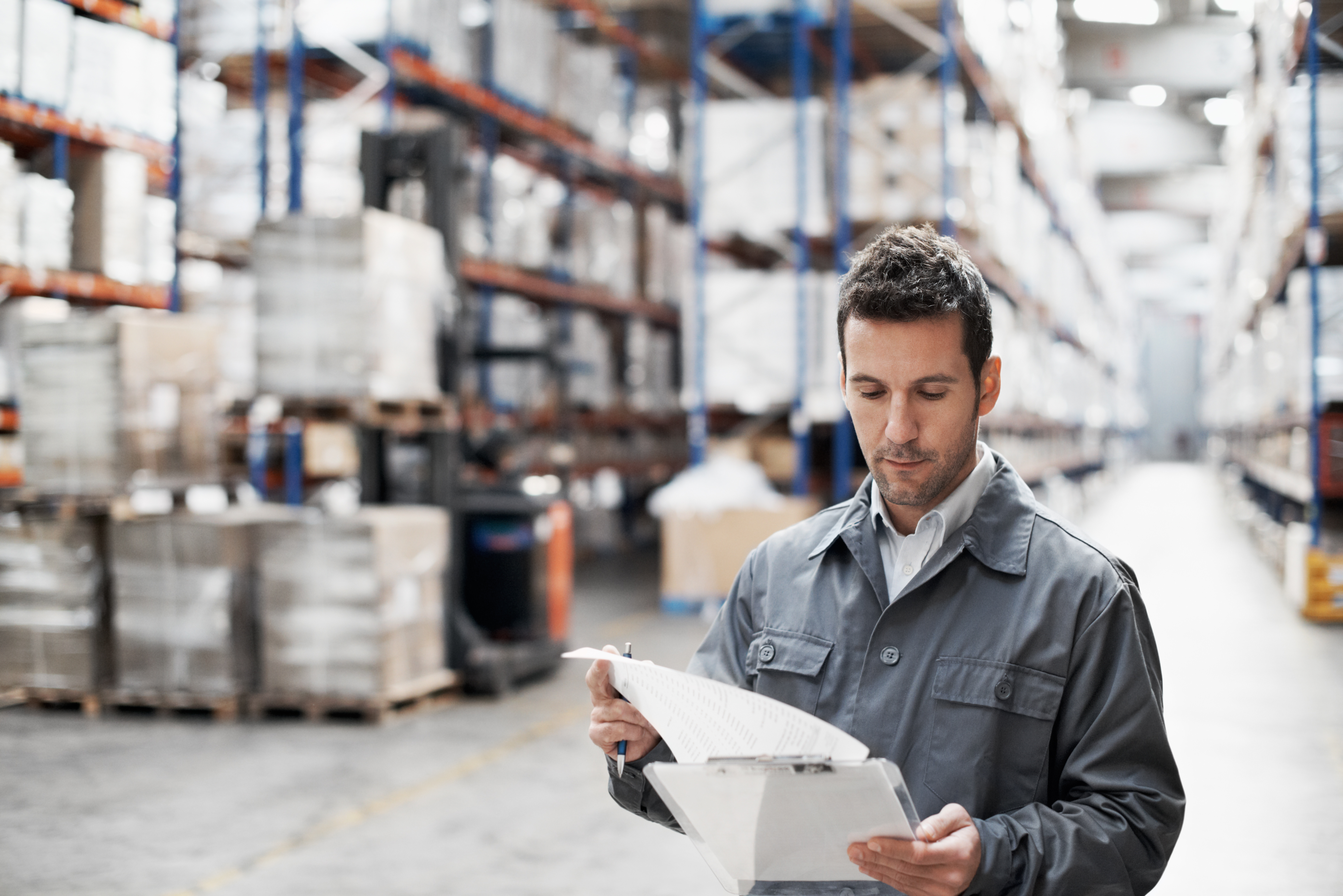 warehouse worker looking at stocktake